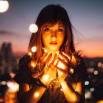 Woman Holding Fireflies