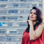 woman in red sleeveless top