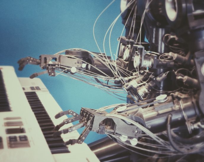 robot playing piano