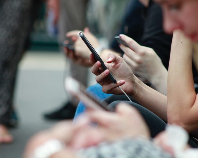 person holding black phone