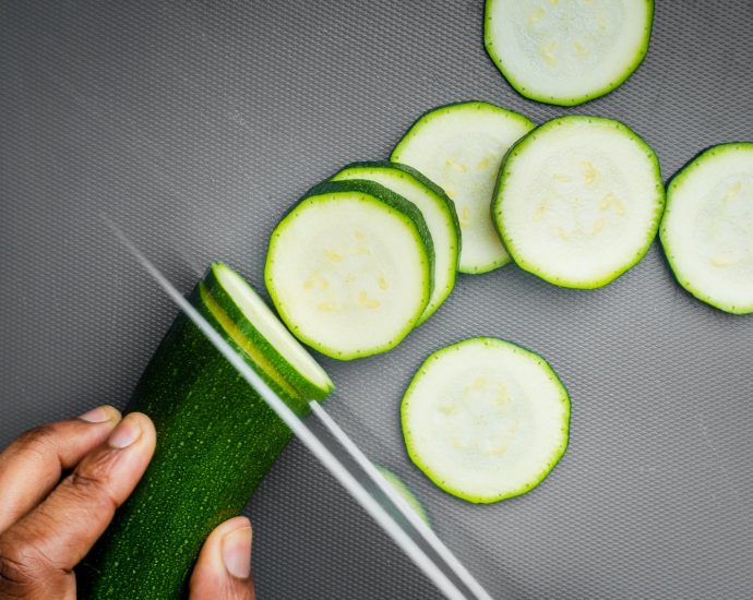 sliced cucumber on black textile