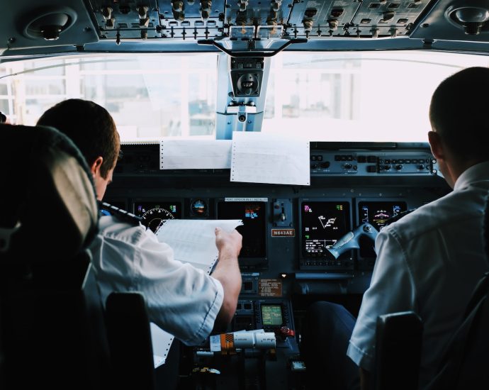 two men inside the plane