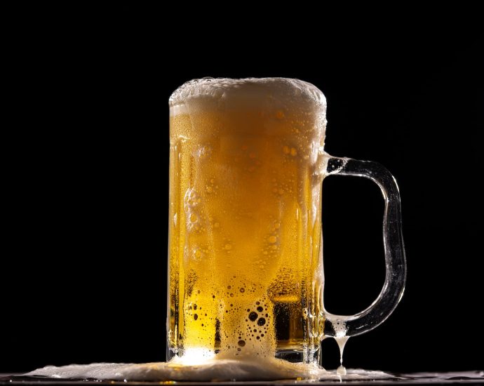 clear glass beer mug with beer