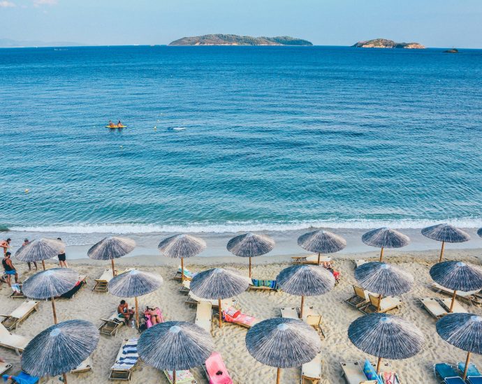 beach lounge on seashore facing the sea