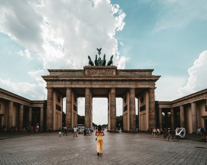 woman standing near building