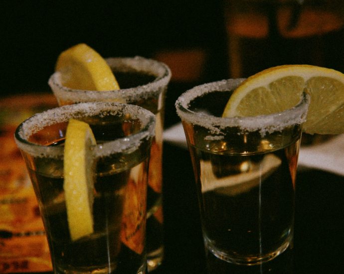 clear drinking glass with sliced lemon