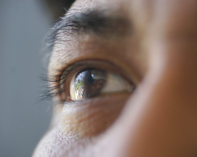 persons eye in close up photography