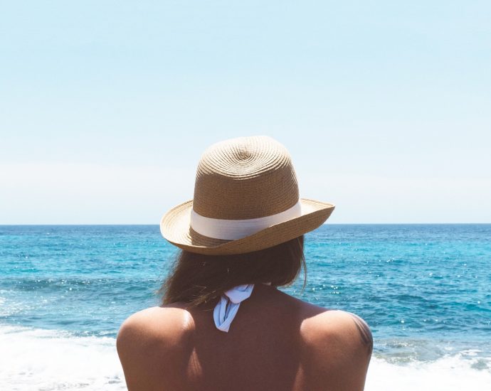 woman standing on beach