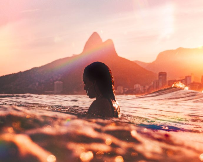 woman swimming on the ocean photography