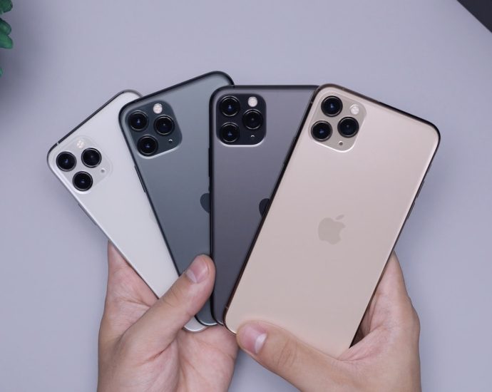 two space gray and two silver iPhone 11's