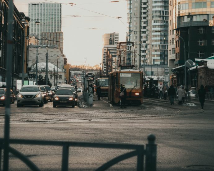 a city street filled with lots of traffic