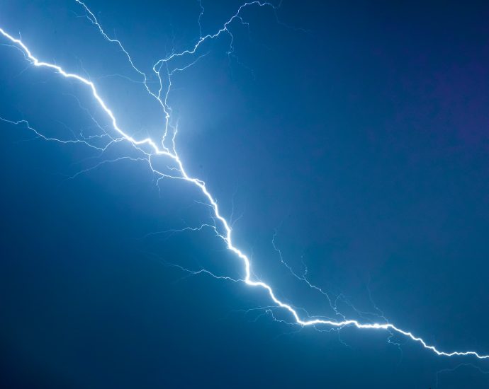 a lightning bolt is seen in the sky