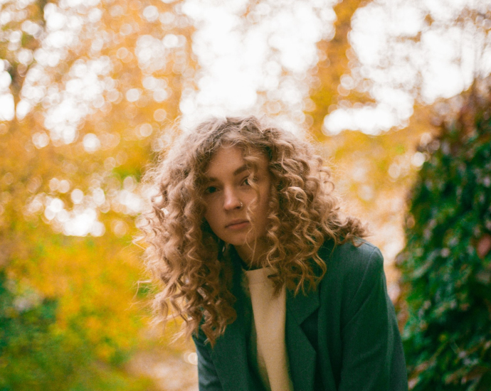 woman in green blazer