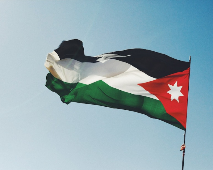 Jordan flag on rock formation