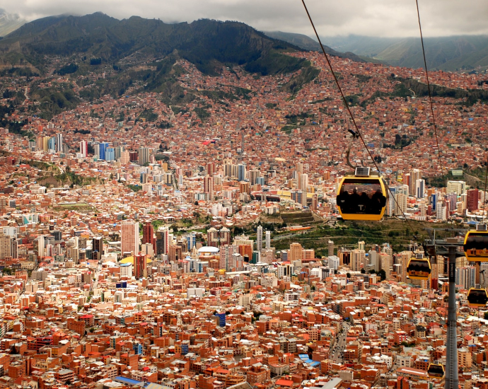 four running cable cars during daytime