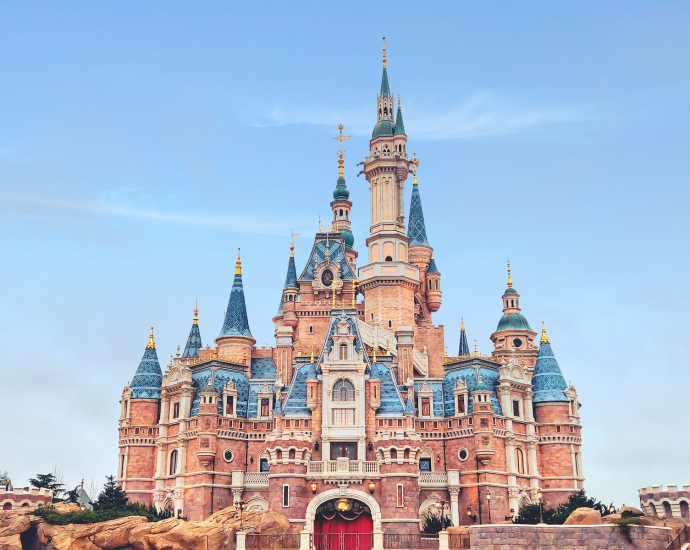 brown and blue concrete castle under blue sky during daytime