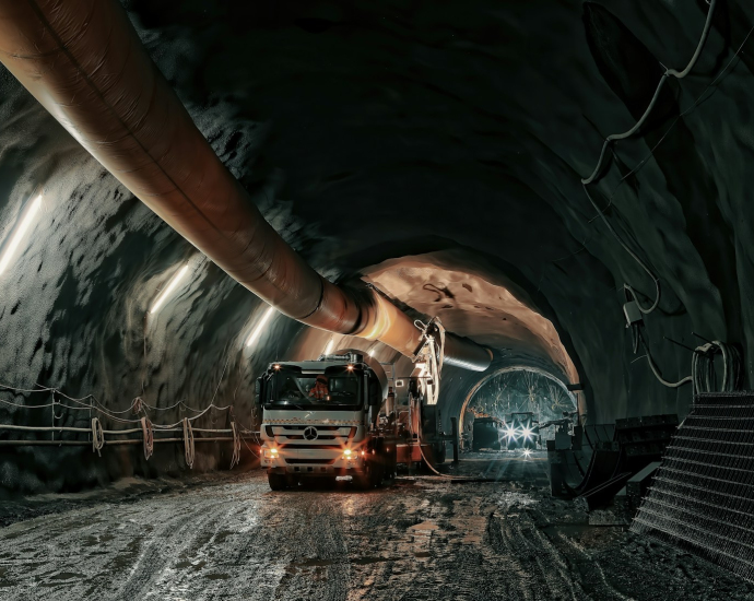 red and black truck in tunnel