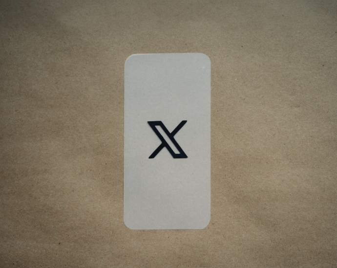 a white card with a black x on it