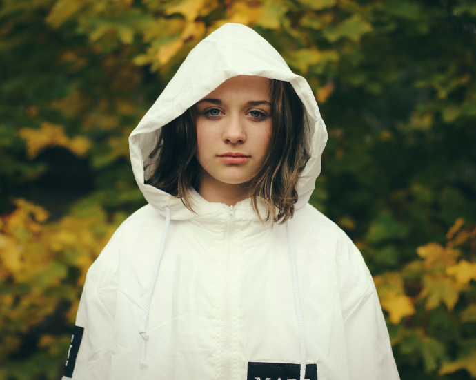 woman wearing white zip-up hoodie jacket