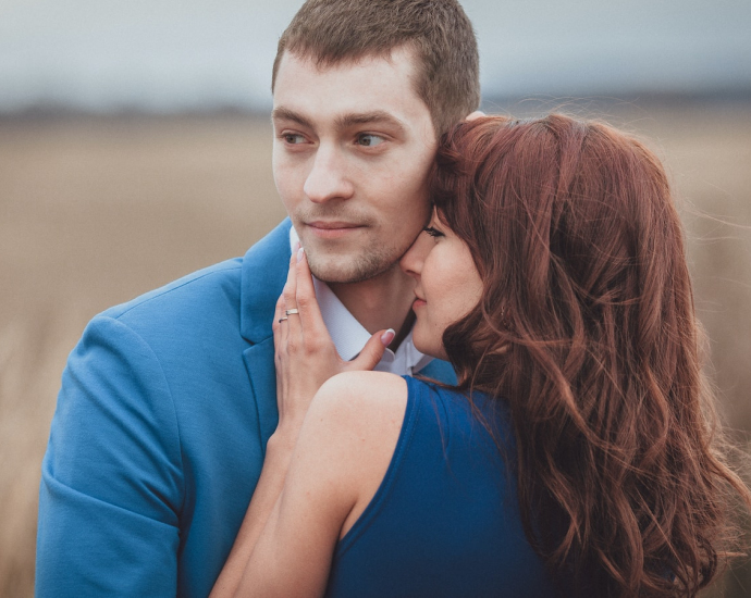 a man and woman kissing