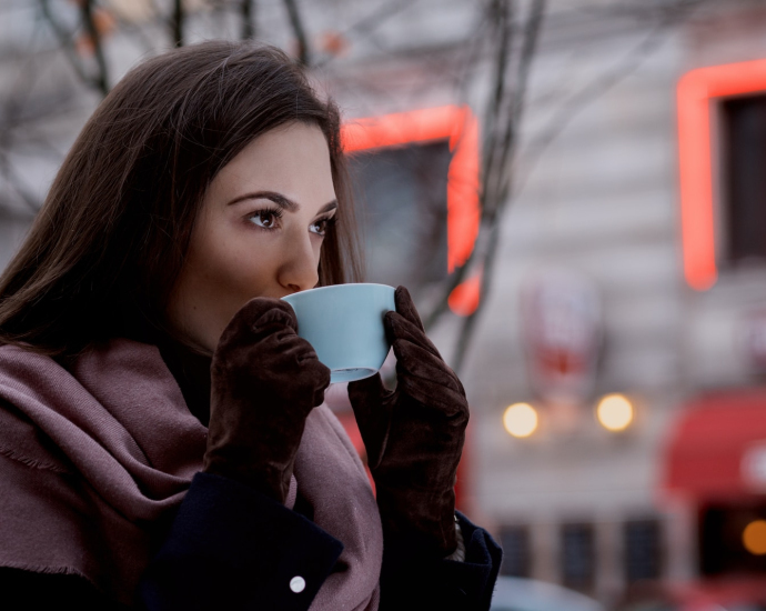 woman sipping coffee