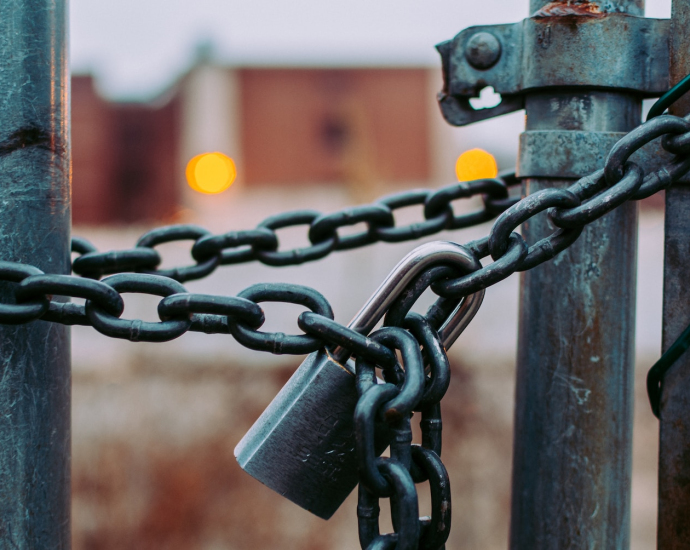 macro shot of stainless steel padlock