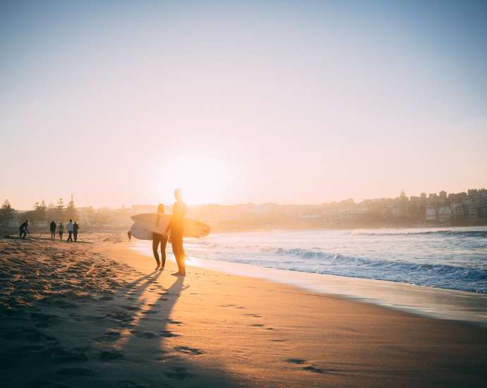 group of people on seashore during daytime