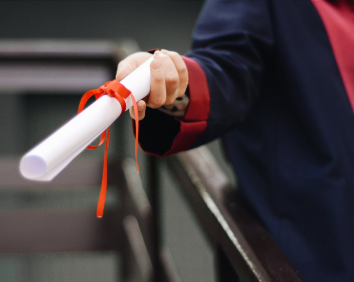 Person Holding White Scroll