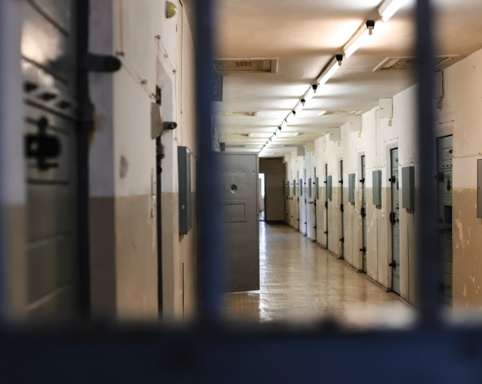 a long hallway with a bunch of lockers in it