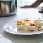 sliced hard boiled eggs on plate