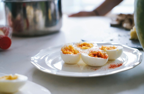 sliced hard boiled eggs on plate