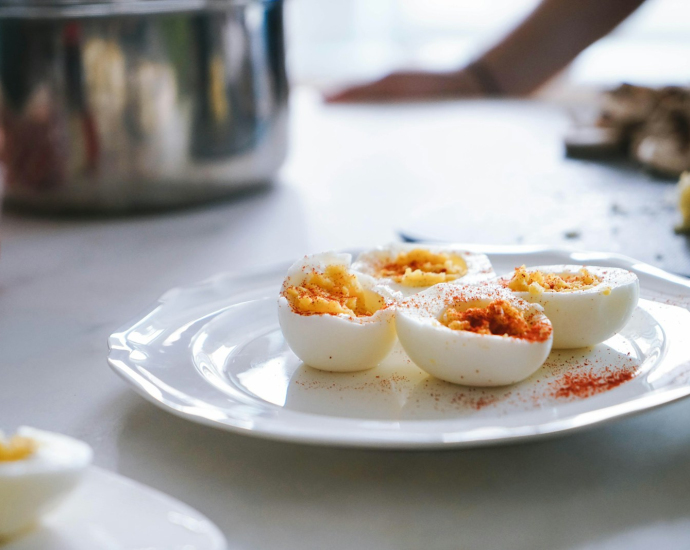 sliced hard boiled eggs on plate