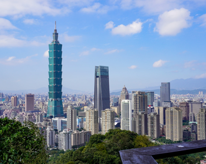 city skyline under blue sky during daytime