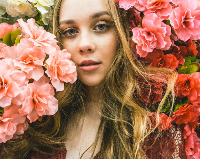 woman carrying flowers