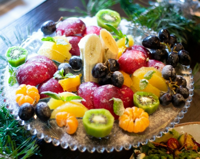 sliced fruit on clear glass bowl