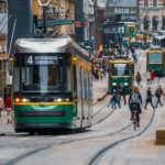 green and yellow city tram