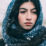 a woman with a scarf around her head