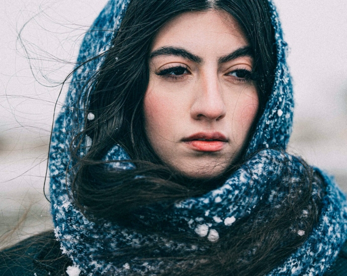 a woman with a scarf around her head