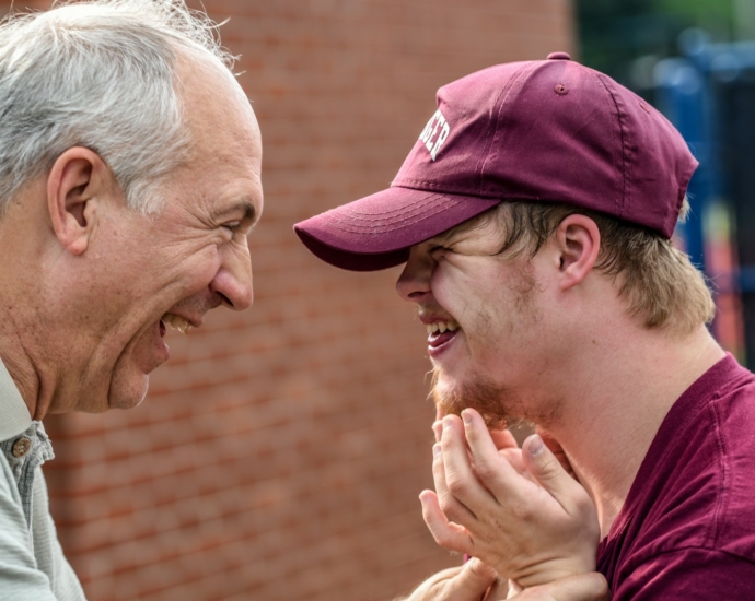 two man laughing at each other