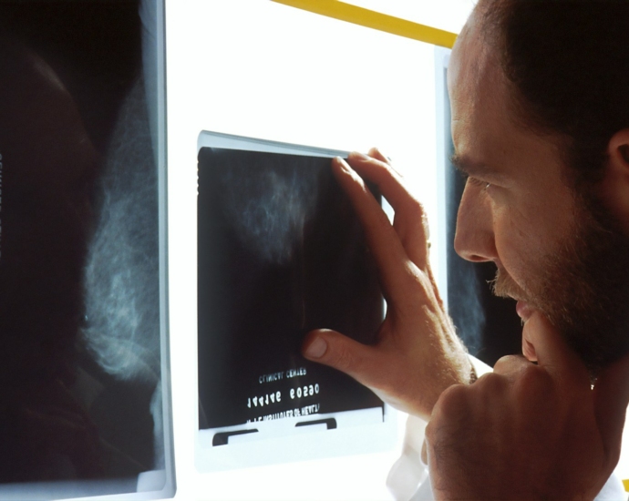 person holding black tablet computer