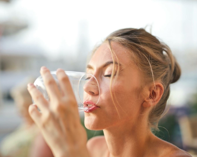 Woman Drinking from Glass