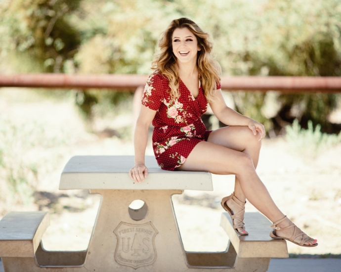 woman sitting on table