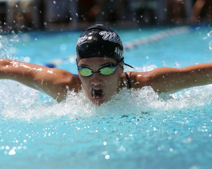 person in swimming goggles in swimming pool