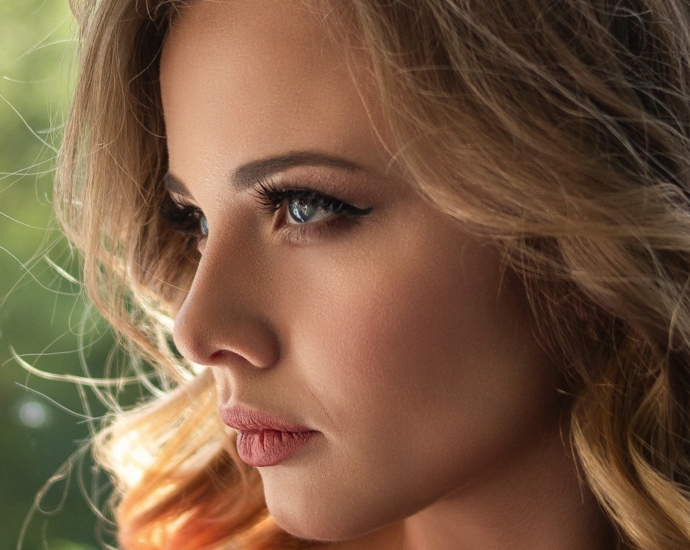 woman with long curly blonde hair