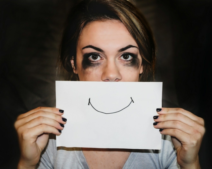 person holding white printer paper