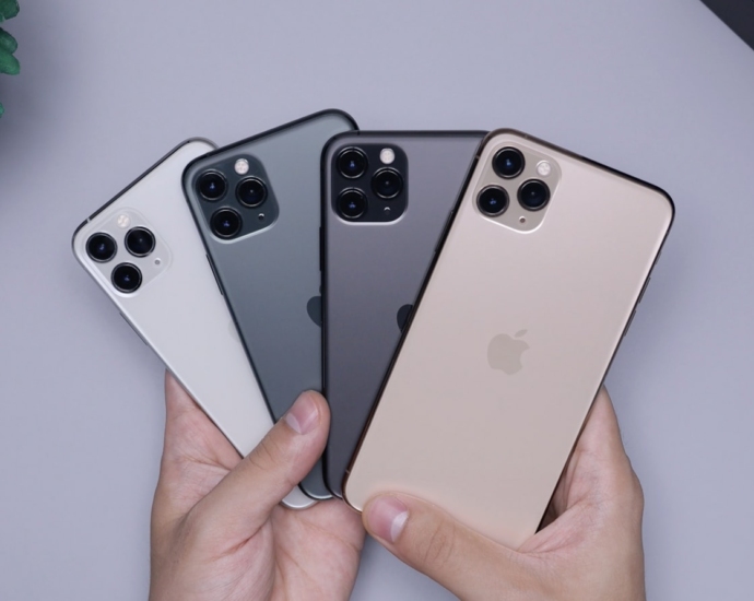 two space gray and two silver iPhone 11's