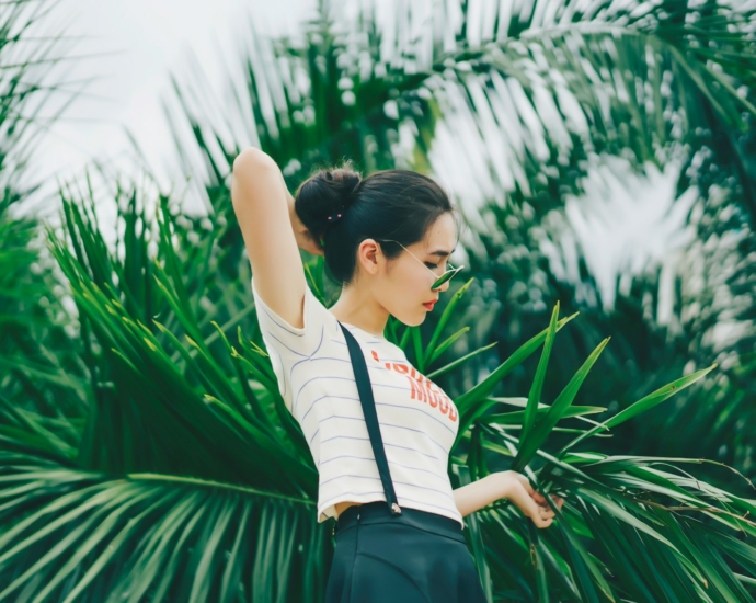 woman fixing her hair