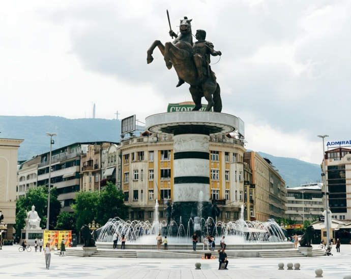 A statue of a man on a horse in a square