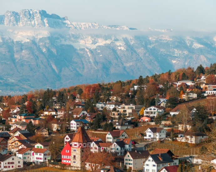 a town in front of a mountain