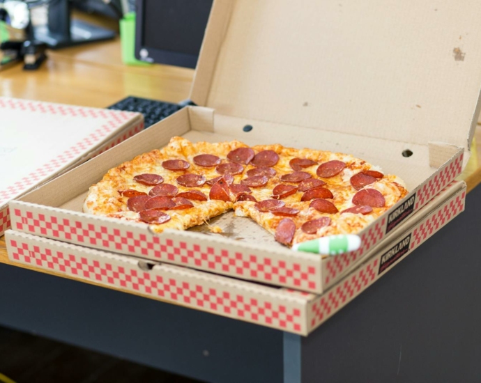 Pizza With Box on Table